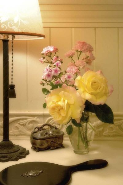 Flower arrangement next to lamp